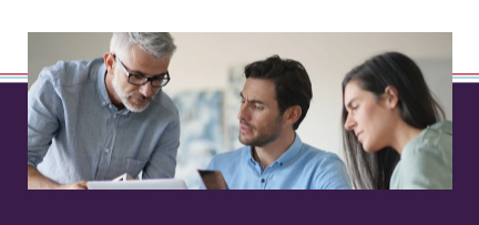 People working together at a computer 